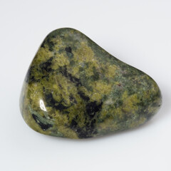 Polished Green Serpentine Gemstone on White Background