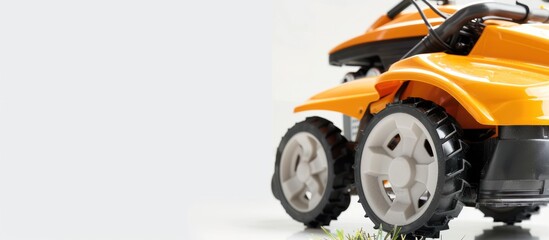 Lawn mower close up. Lawn mower standing on white background