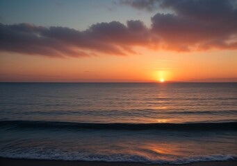 Obraz premium Sunset Over Calm Ocean Waves