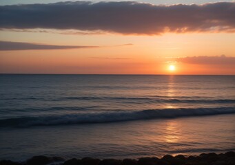 Sunset Over Calm Ocean Waves