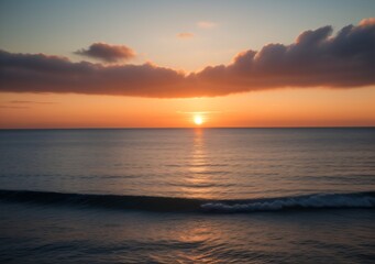 Obraz premium Sunset Over Calm Ocean Waves