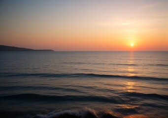 Fototapeta premium Sunset Over Calm Ocean Waves