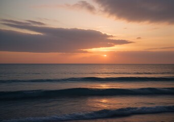 Fototapeta premium Sunset Over Calm Ocean Waves