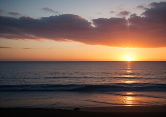 Fototapeta premium Sunset Over Calm Ocean Waves