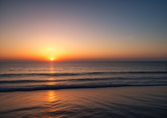 Fototapeta premium Sunset Over Calm Ocean Waves