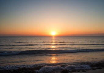 Obraz premium Sunset Over Calm Ocean Waves