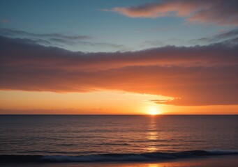 Fototapeta premium Sunset Over Calm Ocean Waves