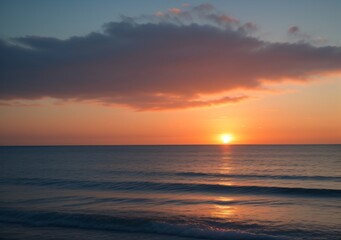 Obraz premium Sunset Over Calm Ocean Waves