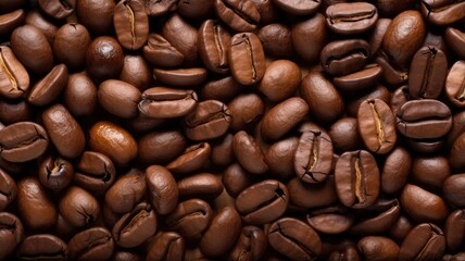 Fototapeta premium A close-up view of roasted coffee beans, showcasing their rich texture and color.