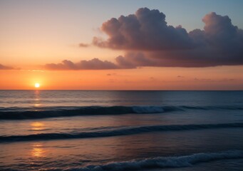 Fototapeta premium Sunset Over Calm Ocean Waves