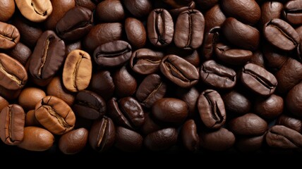 Obraz premium A close-up view of various coffee beans showcasing different roast levels and colors.