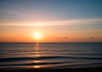 Obraz premium Sunset Over Calm Ocean Waves