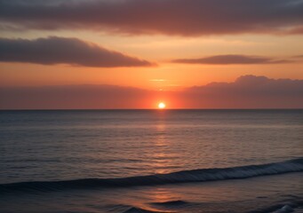 Obraz premium Sunset Over Calm Ocean Waves