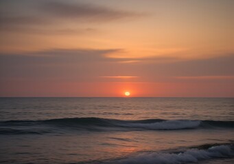Fototapeta premium Sunset Over Calm Ocean Waves
