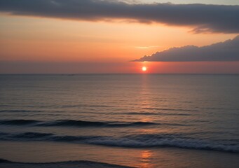 Fototapeta premium Sunset Over Calm Ocean Waves