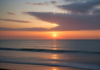 Fototapeta premium Sunset Over Calm Ocean Waves
