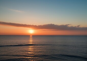 Sunset Over Calm Ocean Waves
