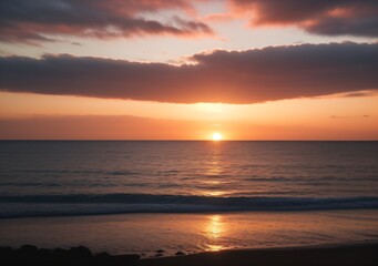 Obraz premium Sunset Over Calm Ocean Waves