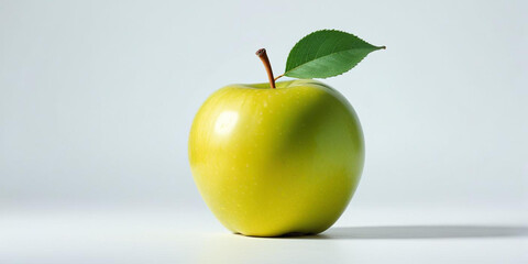 A green apple with a leaf, on a white background