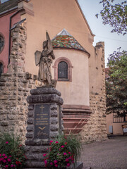 Eguisheim, France - 09-09-2023 : Statue in tribute to people who died during world wars
