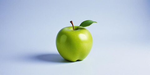 A green apple with a leaf, on a white background