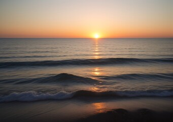 Fototapeta premium Sunset Over Calm Ocean Waves