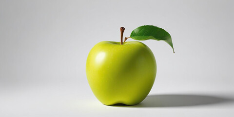 A green apple with a leaf, on a white background 