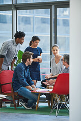 Fototapeta premium Business people, paperwork and startup in workspace for collaboration, talking and creative idea. Documents, brainstorming and partnership in workplace for teamwork, strategy or pitch with diversity