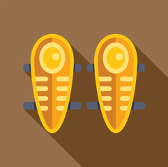 Pair of ancient egyptian golden battle shields hanging on a brown wall, side by side