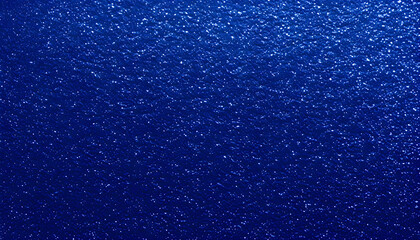 Obraz premium royal blue glitter texture, filling the entire frame, creating a deep, luxurious, and rich blue surface that captivates with consistent glitter and sparkles