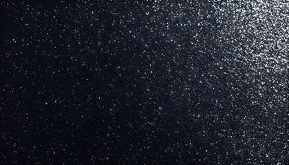 Obraz premium black glitter texture, filling the entire frame, creating a sleek, shiny, and elegant surface with continuous glitter that offers a modern and sophisticated look.