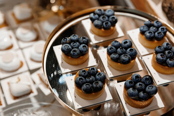 candy bar, Delicious dessert table, macaroons decorated, Delicious wedding, colorful topping, Bakery sweet, holiday. Birthday, wedding,