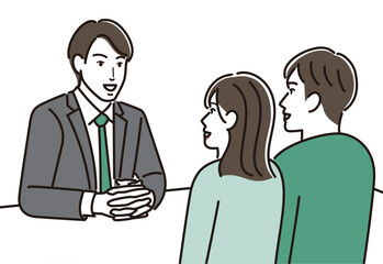説明するビジネスマンと説明を受ける夫婦