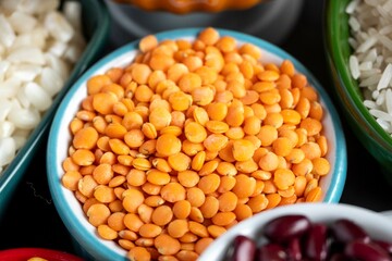 several pots with raw grains for preparing healthy food