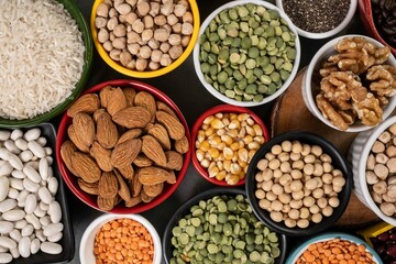 several pots with raw grains for preparing healthy food