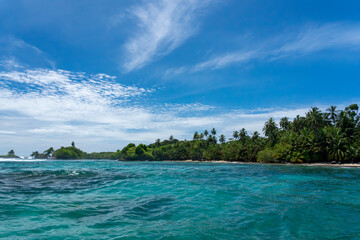 Tropical Island Paradise with Crystal Clear Water, Lush Greenery, and Serene Beaches - Stunning Caribbean Landscape for Eco-Tourism, Adventure, and Unspoiled Nature Travel Destinations