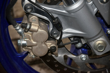 disc brake calipers on the front wheels of motorbikes