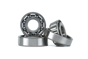 Set of metal ball bearings in various sizes isolated on a white background