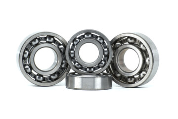 Set of metal ball bearings in various sizes isolated on a white background