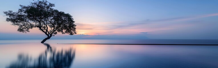 Naklejka premium tranquil infinity pool with ocean view.