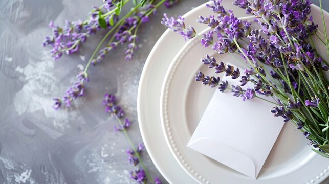 189. Delightful summer table arrangement with fresh lavender and a thank you card atop a white plate, radiating gratitude and seasonal appeal