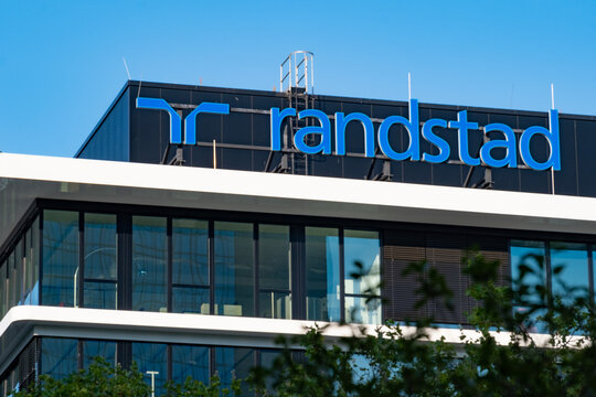 Randstad logo on office building, german global leader in HR services industry, recruiting agency for personnel selection, Job in Frankfurt, Germany - September 1, 2024