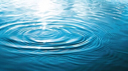 230. Peaceful spa concept background featuring a calming blue water surface with subtle rings and ripples, ideal for creating a serene, renewing environment