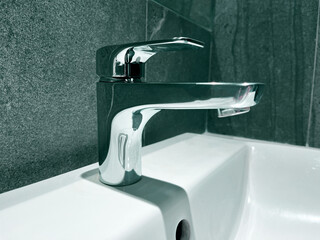 faucet in a bathroom, water faucet, stopping tap water in bathroom, faucet and water flow, opening...