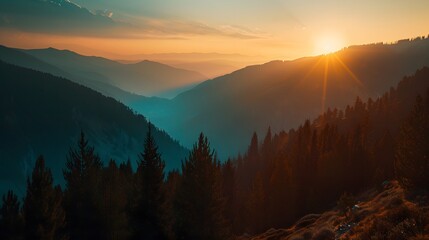 Obraz premium Majestic Sunset over Mountain Range with Golden Rays