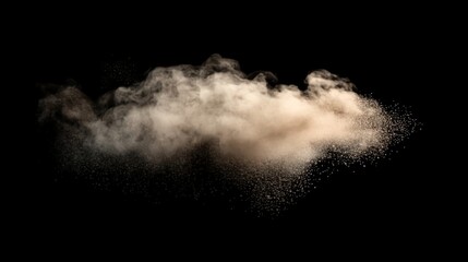 A cloud of brown dust explodes on a black background.