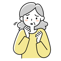 困った表情のシニア女性の上半身