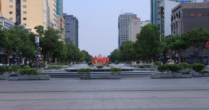 A fountain at the downtown at Nguyen Hue street in Ho Chi Minh wide shot