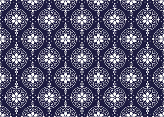 White symbol floral on dark blue background, ethnic fabric seamless pattern, design for cloth, carpet, batik, wallpaper, wrapping etc.
