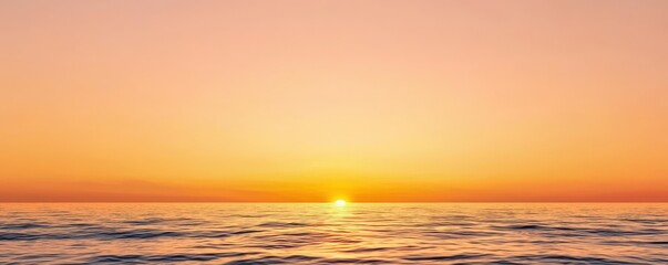 Obraz premium A serene sunset over the ocean, with warm hues reflecting on calm waters, creating a tranquil atmosphere for relaxation.